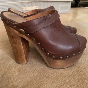 Brown Chanel clogs